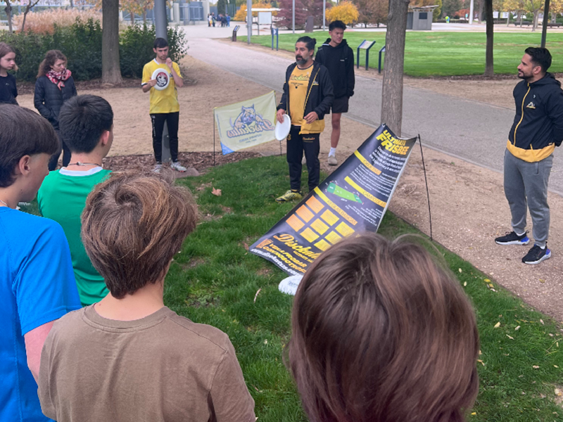 Children learning Ultimate Frisbee